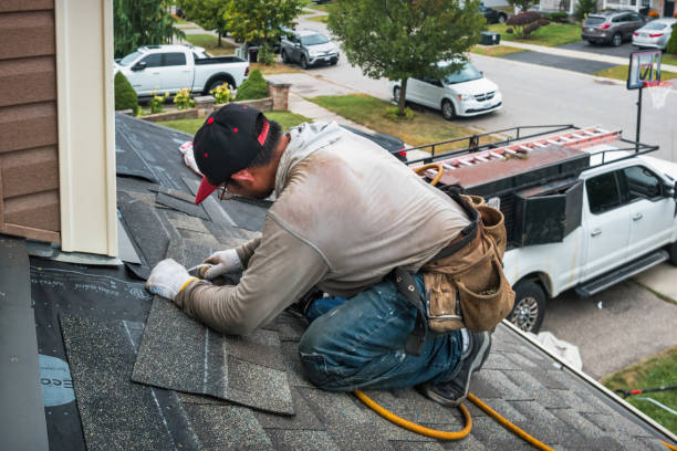 Professional Roofing technician working in Elkhart, KS